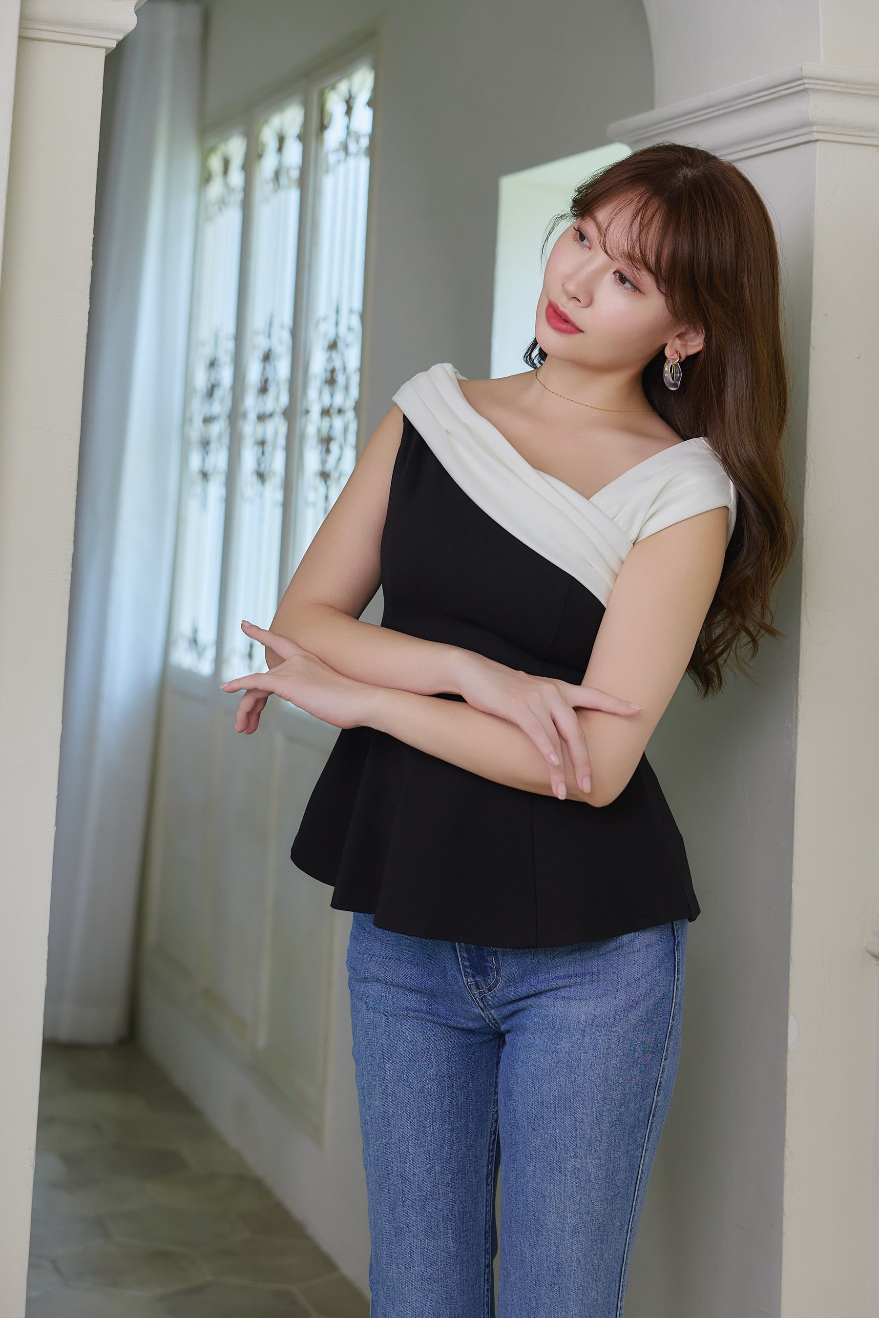 Asymmetric Two-Tone Peplum Top