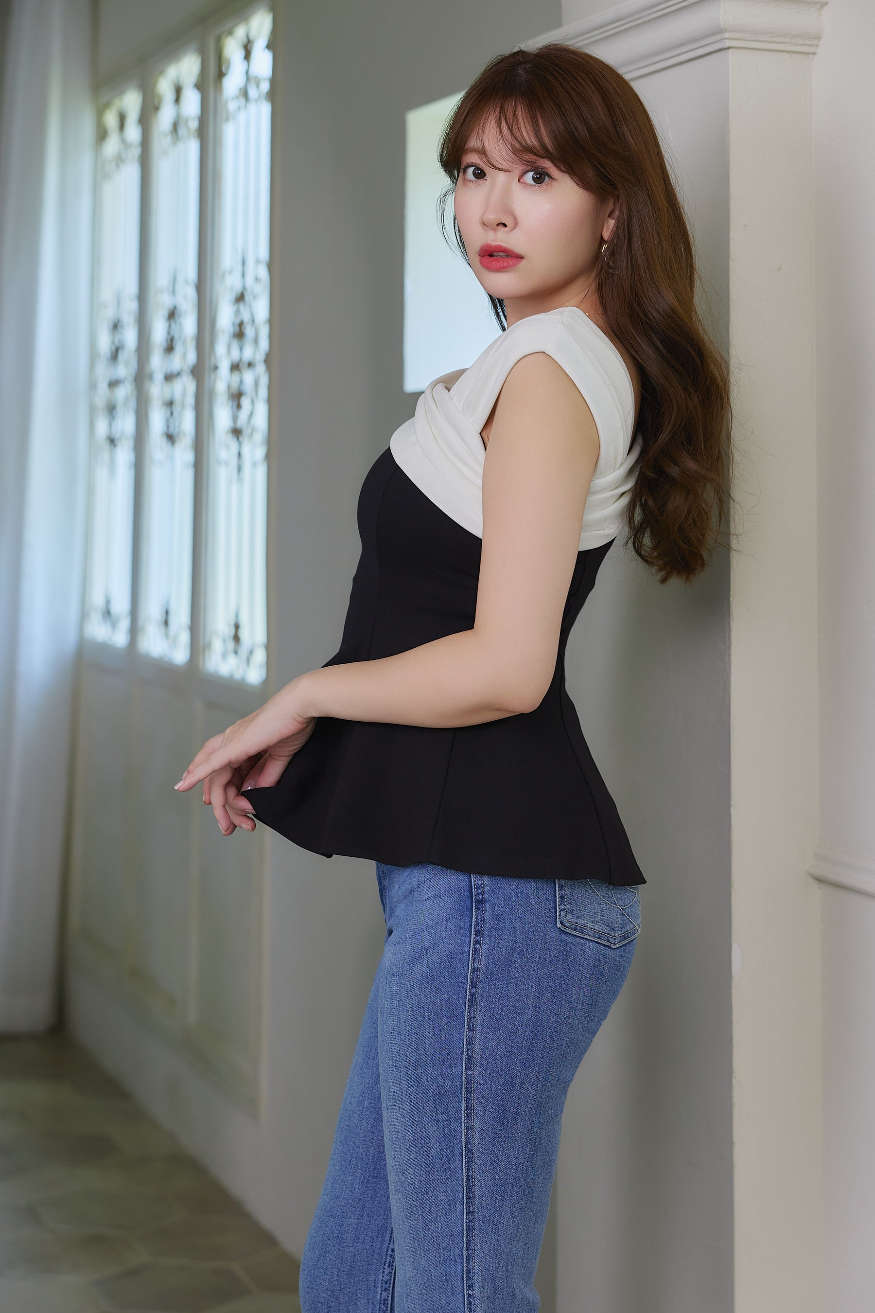 Asymmetric Two-Tone Peplum Top