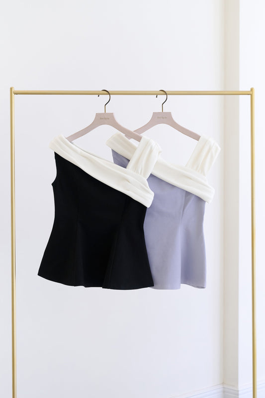 Asymmetric Two-Tone Peplum Top