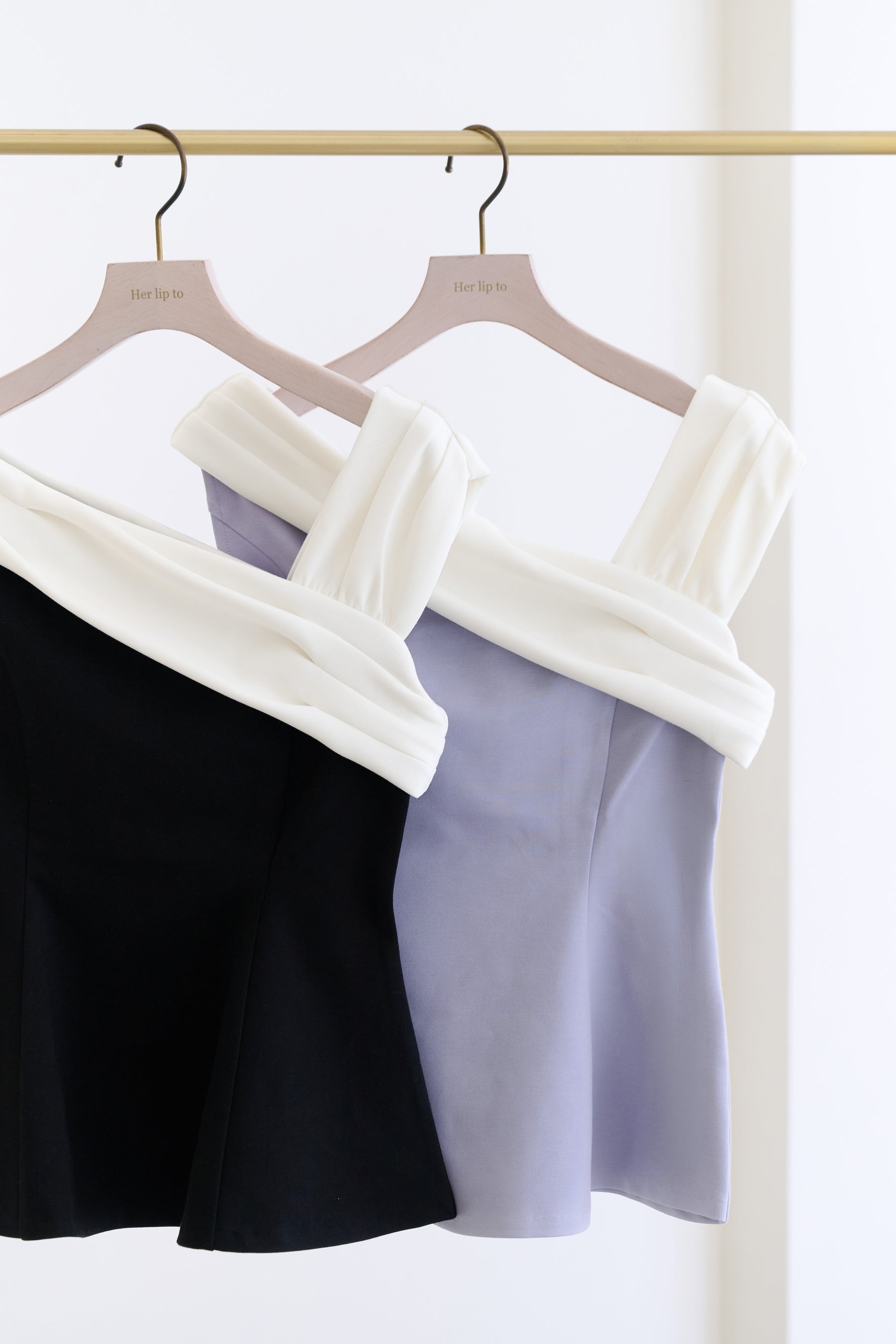 Asymmetric Two-Tone Peplum Top