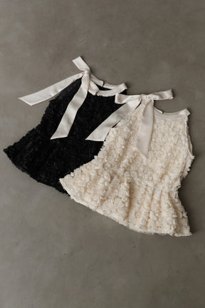 Rosette Peplum Top