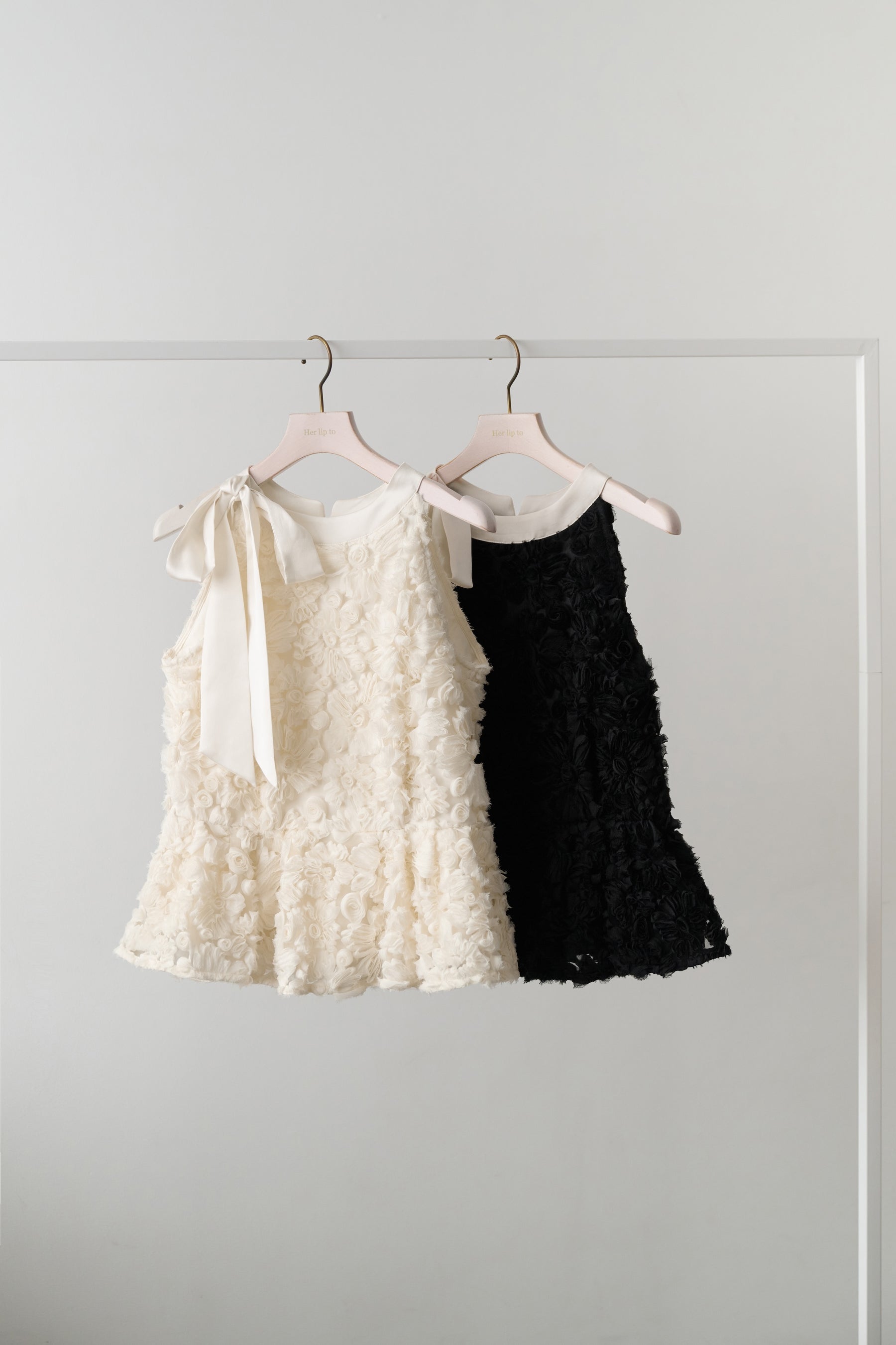 Rosette Peplum Top