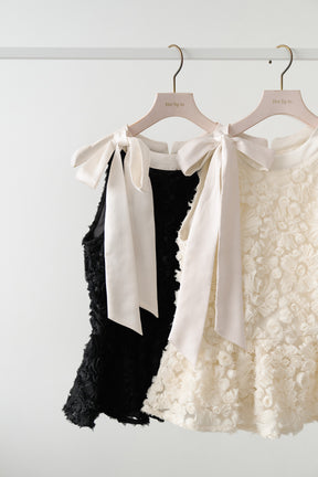 Rosette Peplum Top