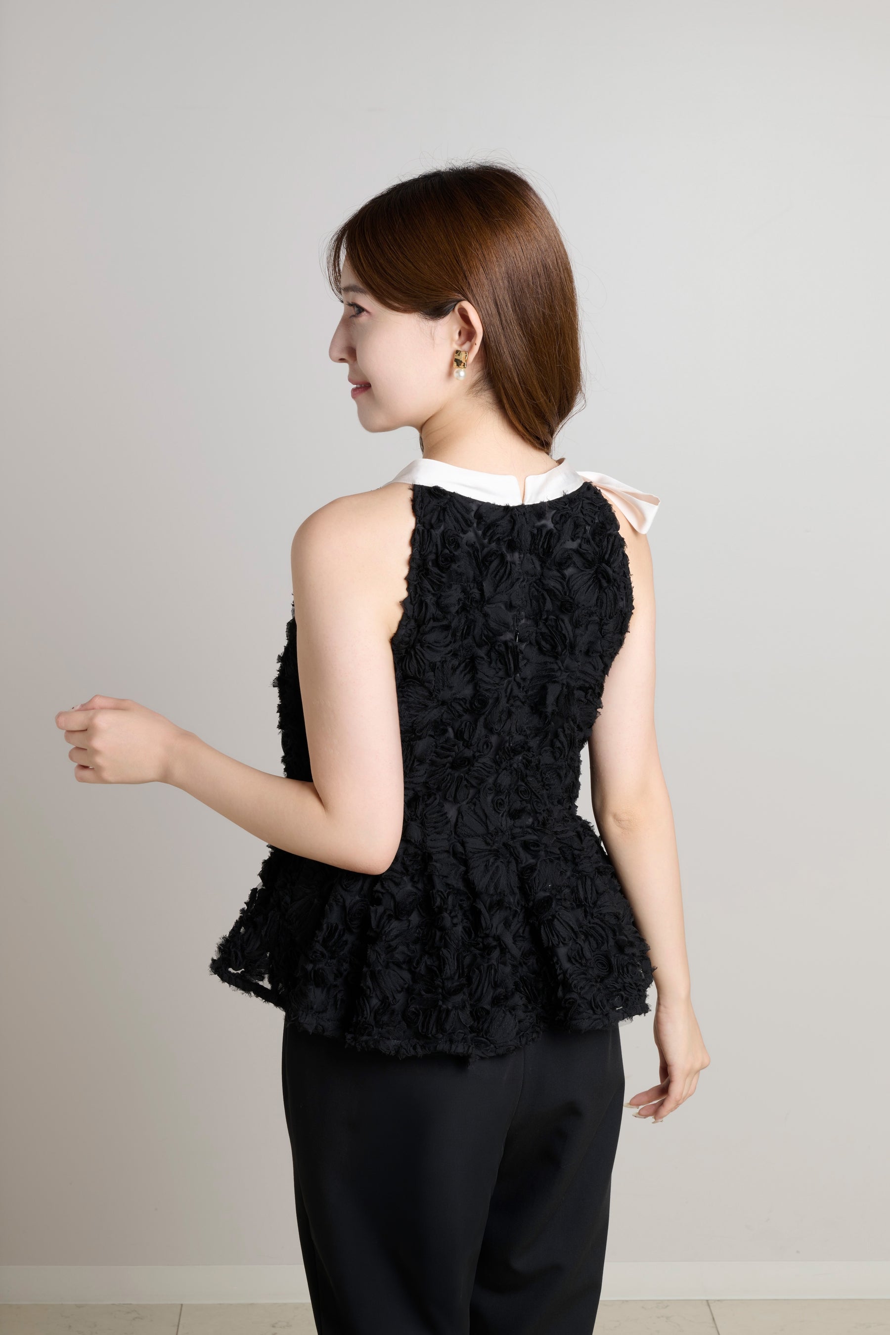 Rosette Peplum Top