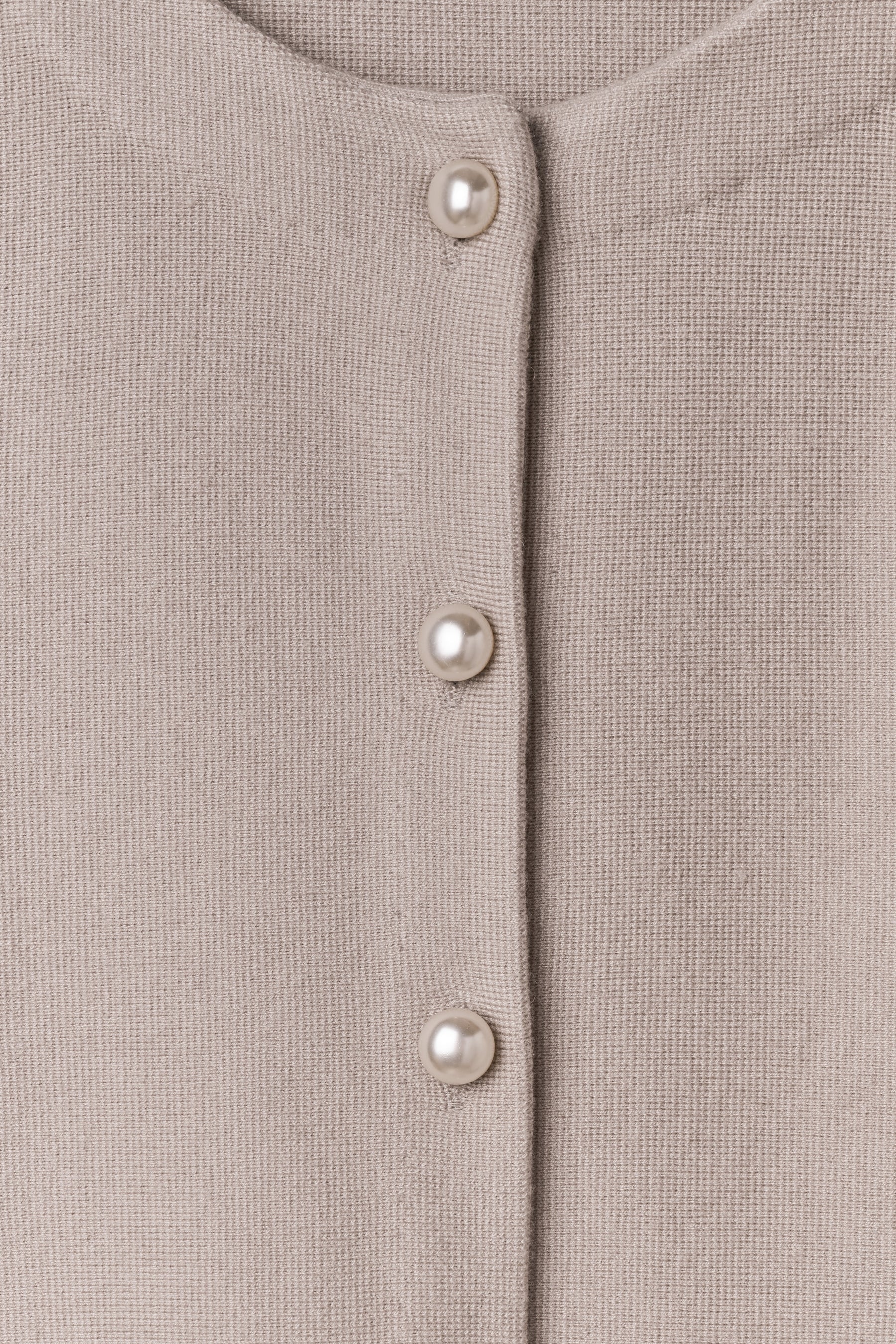 ［Essentia］Curved-Sleeve Peplum Knit Jacket