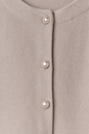 ［Essentia］Curved-Sleeve Peplum Knit Jacket