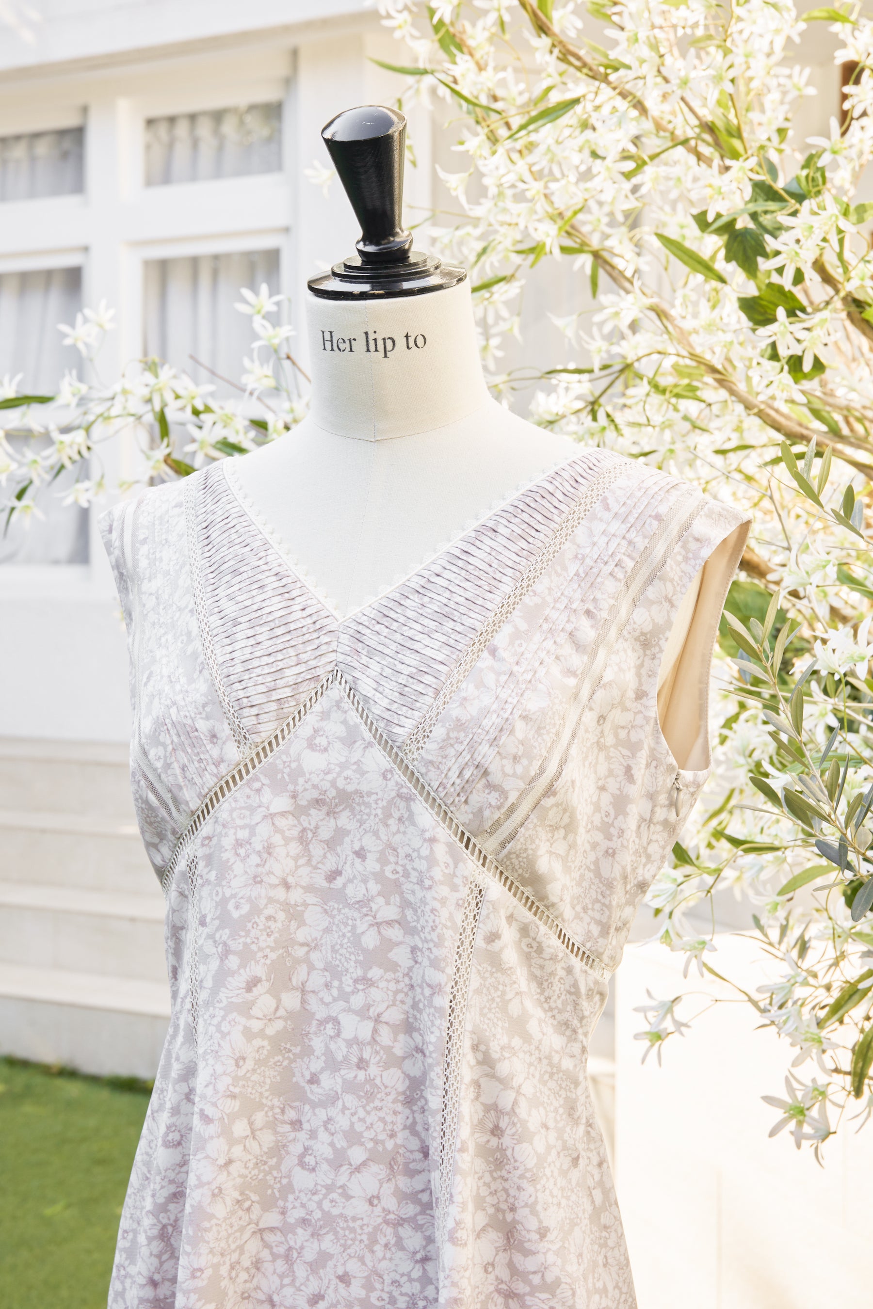 her lip to Lace Trimmed Floral Dress | www.beverlyhillsmagazine.com