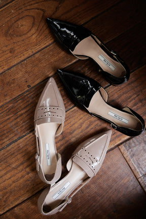 Medallion Heel Loafer