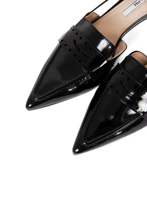 Medallion Heel Loafer