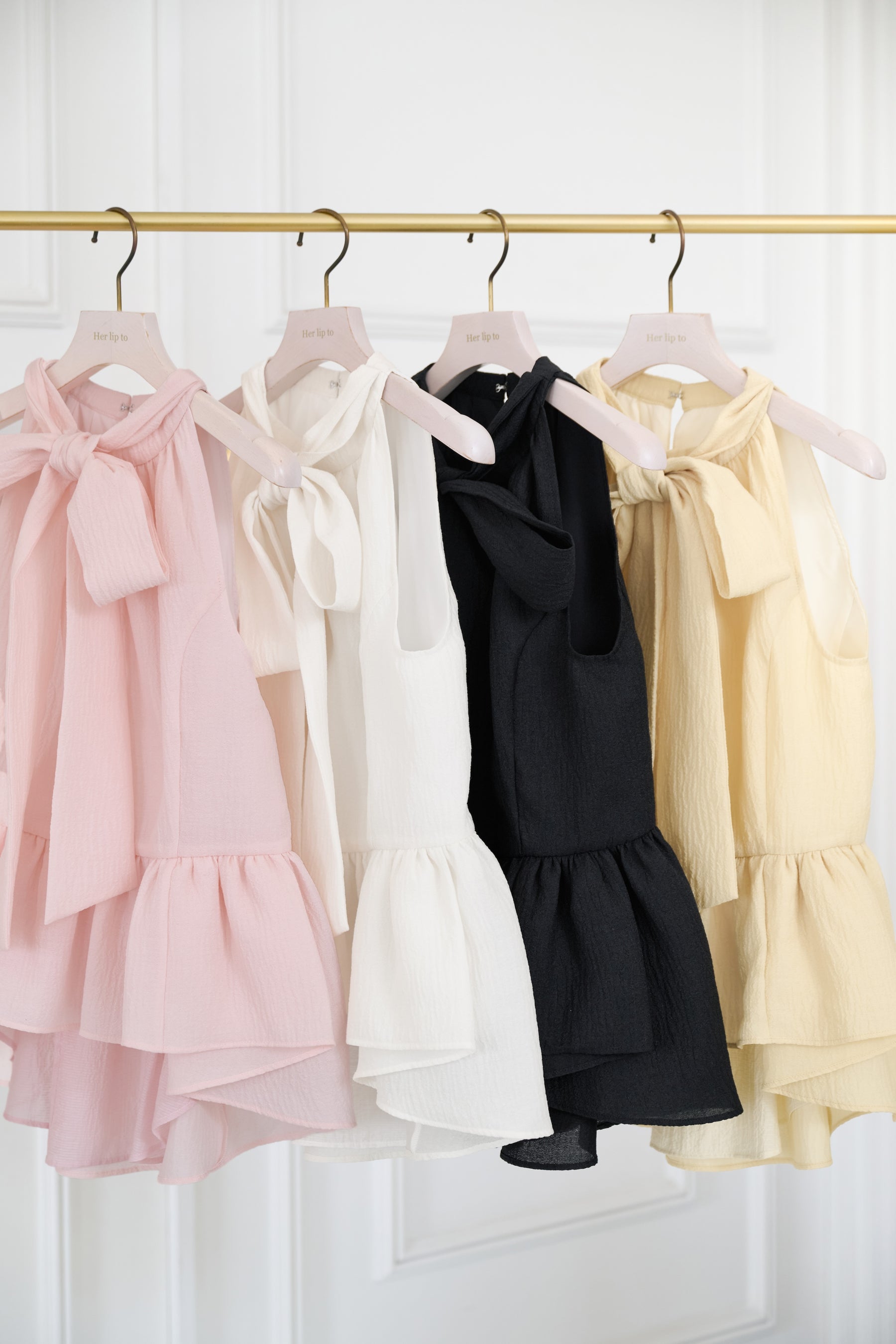 Mila Bow Peplum Blouse		