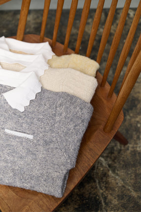 Petal-Edge Collar Knit Top