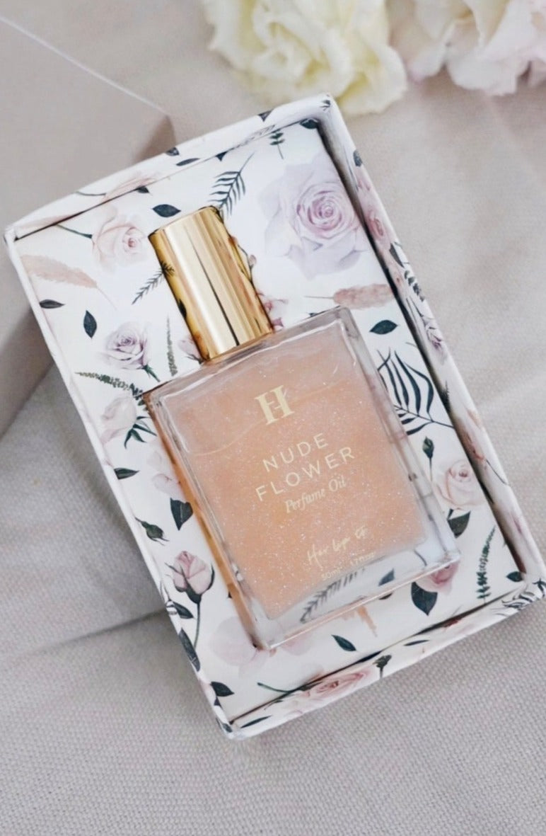 her lip to  NUDE FLOWER perfume oil